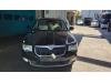 Skoda Superb Combi 2.0 TDI 16V 4x4 Sloopvoertuig (2010, Zwart)