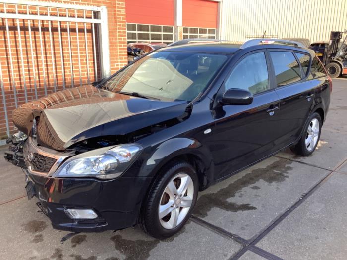 Kia Cee'd Sporty Wagon 1.4 16V Sloopvoertuig (2010, Zwart)