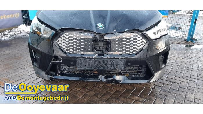 BMW iX2 eDrive20 65/67 kWh Schadevoertuig (2025, Zwart)