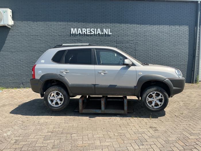 Hyundai Tucson 2.0 16V CVVT 4x2 Sloopvoertuig (2010, Grijs)