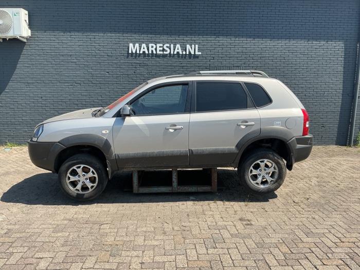 Hyundai Tucson 2.0 16V CVVT 4x2 Sloopvoertuig (2010, Grijs)