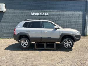 Hyundai Tucson 2.0 16V CVVT 4x2 Sloopvoertuig (2010, Grijs)