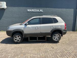 Hyundai Tucson 2.0 16V CVVT 4x2 Sloopvoertuig (2010, Grijs)