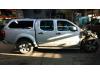 Nissan Navara 2.5 dCi 16V 4x4 Sloopvoertuig (2009, Grijs)