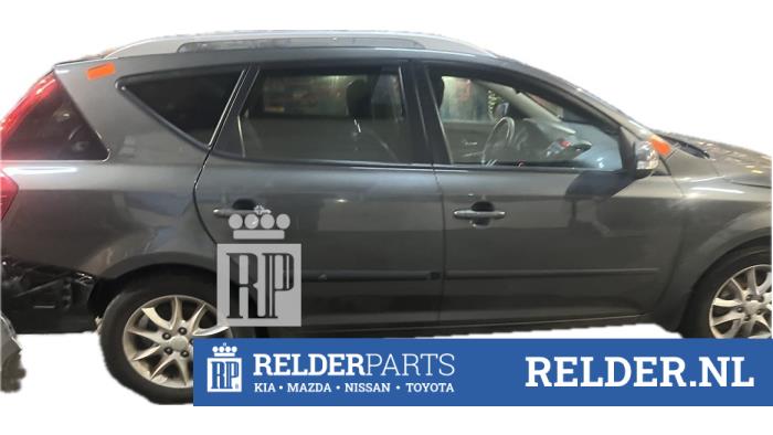 Kia Cee'd Sporty Wagon 1.6 CRDi 115 16V Sloopvoertuig (2011, Grijs)