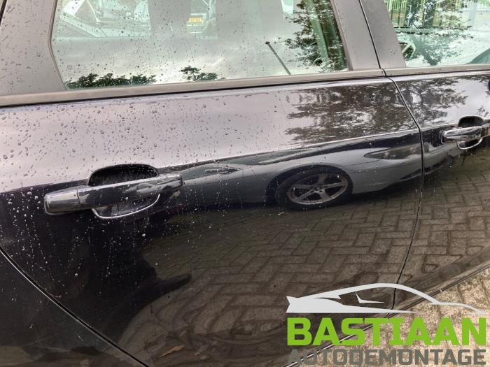 Opel Astra J Sports Tourer 1.3 CDTI 16V ecoFlex Sloopvoertuig (2011, Zwart)