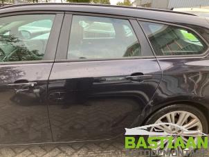 Opel Astra J Sports Tourer 1.3 CDTI 16V ecoFlex Sloopvoertuig (2011, Zwart)
