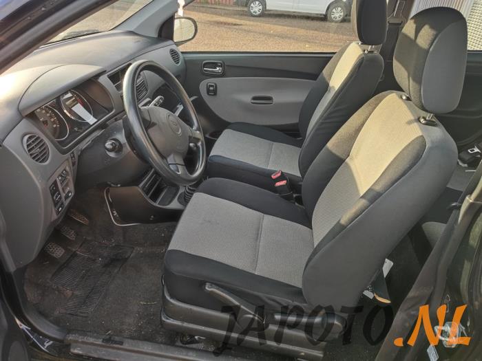 Daihatsu Cuore 1.0 12V DVVT Sloopvoertuig (2003, Zwart)