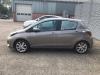 Toyota Yaris III 1.5 16V Hybrid Sloopvoertuig (2015, Bruin)