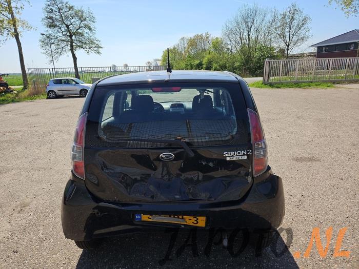 Daihatsu Sirion 2 1.0 12V DVVT Sloopvoertuig (2009, Zwart)
