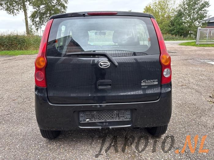 Daihatsu Cuore 1.0 12V DVVT Sloopvoertuig (2009, Zwart)