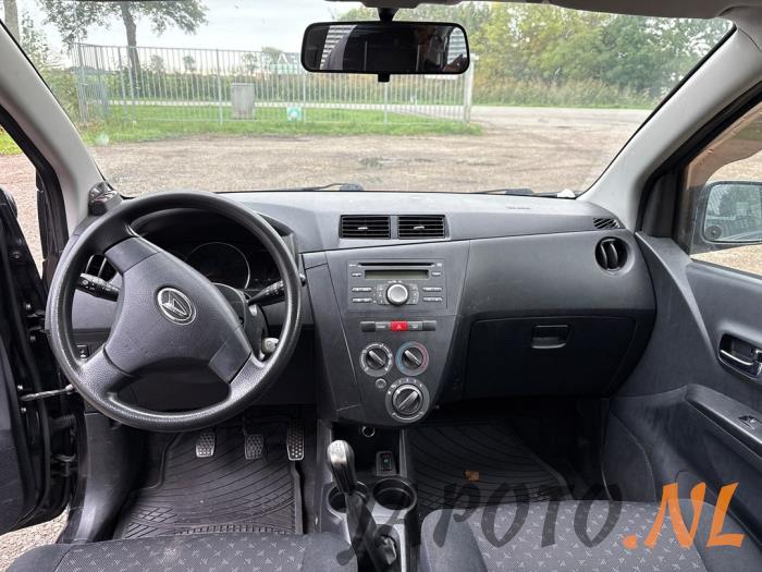 Daihatsu Cuore 1.0 12V DVVT Sloopvoertuig (2009, Zwart)