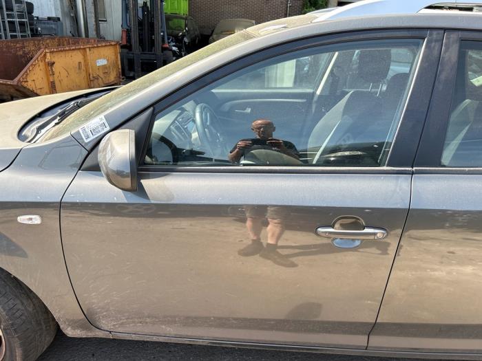 Kia Cee'd Sporty Wagon 1.4 16V Sloopvoertuig (2010, Grijs)