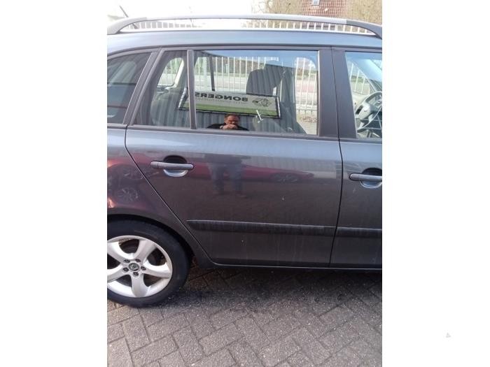 Skoda Fabia II Combi 1.2 TDI 12V Greenline Sloopvoertuig (2011, Grijs)