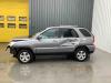 Kia Sportage 2.0 CVVT 16V 4x4 Sloopvoertuig (2009, Zilvergrijs)