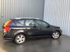 Kia Cee'd Sporty Wagon 1.4 16V Sloopvoertuig (2011, Zwart)