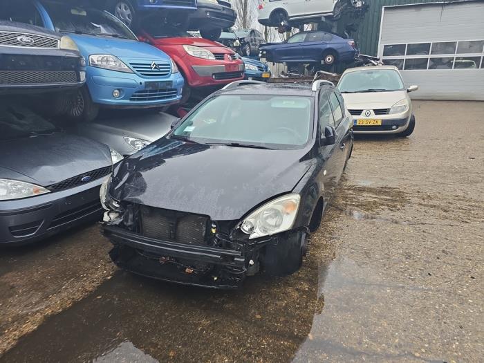 Kia Cee'd Sporty Wagon 1.4 16V Sloopvoertuig (2009, Zwart)