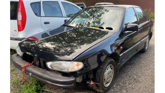 Hyundai Lantra/Elantra I 1.5i GL,GLS 8V Sloopvoertuig (1995, Zwart)