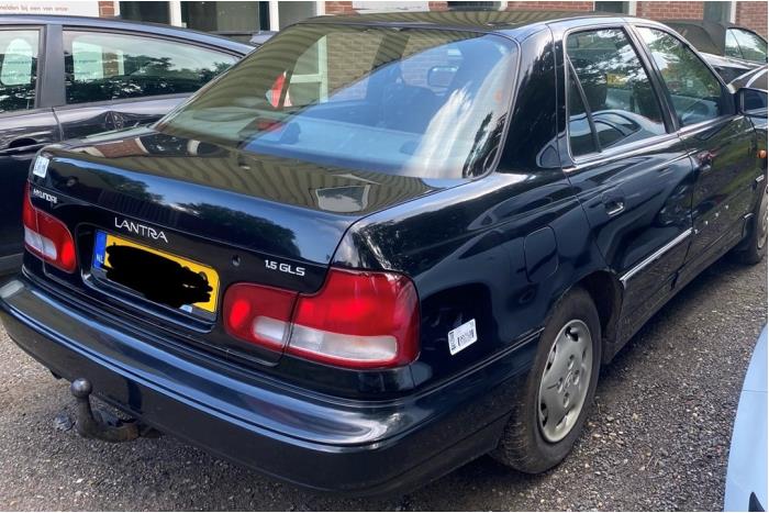 Hyundai Lantra/Elantra I 1.5i GL,GLS 8V Sloopvoertuig (1995, Zwart)