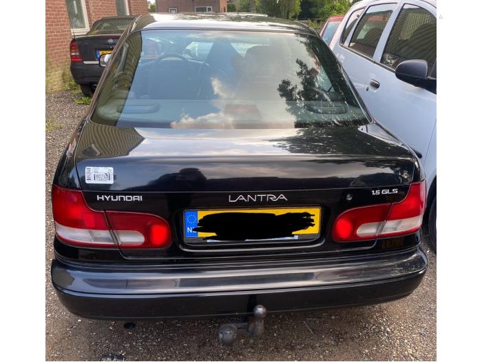Hyundai Lantra/Elantra I 1.5i GL,GLS 8V Sloopvoertuig (1995, Zwart)