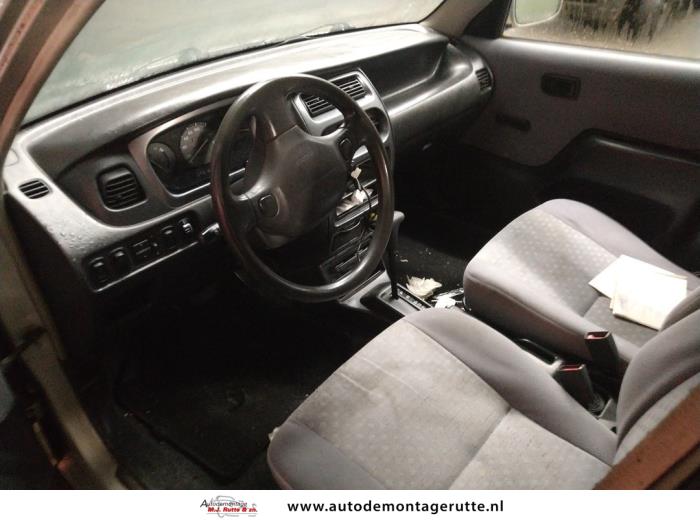 Daihatsu Sirion/Storia 1.0 12V DVVT Sloopvoertuig (2000, Grijs)