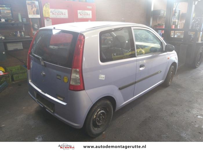 Daihatsu Cuore 1.0 12V DVVT Sloopvoertuig (2003, Paars)