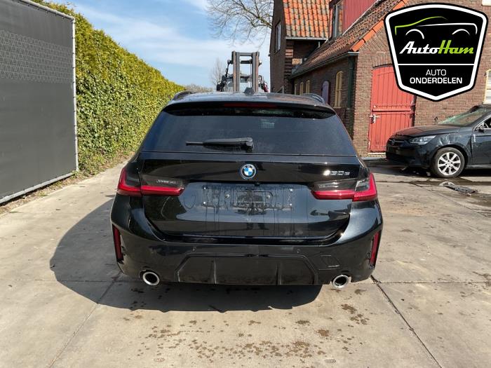 BMW 3 serie Touring 330e 2.0 TwinPower Turbo 16V Sloopvoertuig (2023, Zwart)