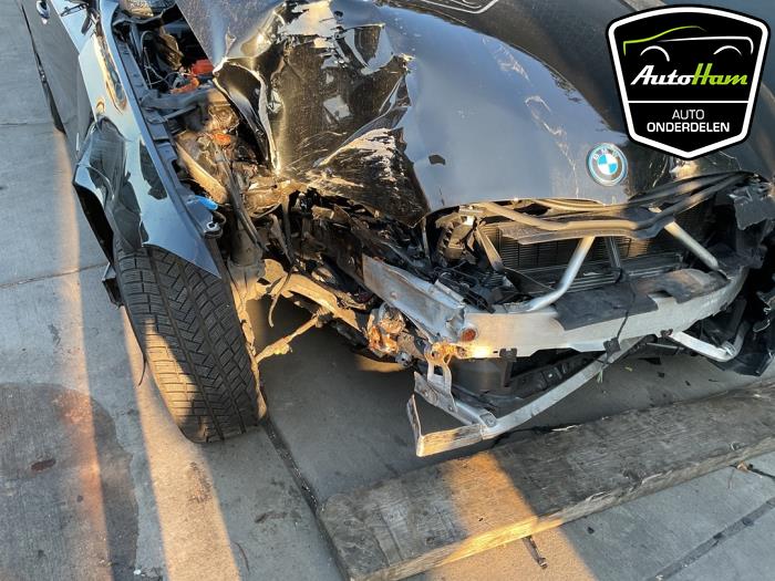 BMW 3 serie Touring 330e 2.0 TwinPower Turbo 16V Sloopvoertuig (2023, Zwart)