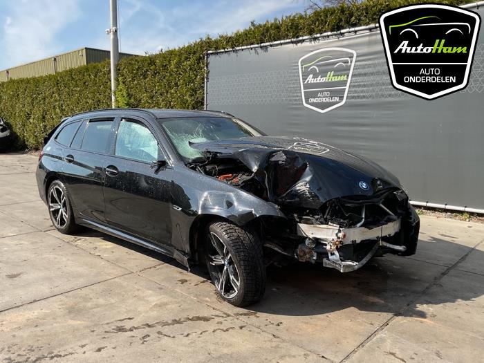 BMW 3 serie Touring 330e 2.0 TwinPower Turbo 16V Sloopvoertuig (2023, Zwart)