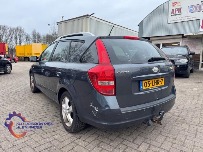 Kia Cee'd Sporty Wagon 1.4 16V Sloopvoertuig (2010, Donker, Zilvergrijs)