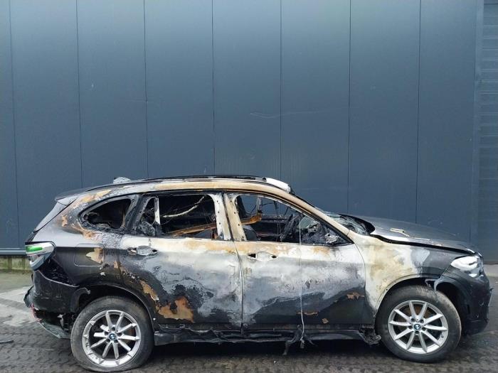 BMW X1 sDrive 18i 1.5 12V TwinPower Turbo Sloopvoertuig (2019, Donker, Bruin)