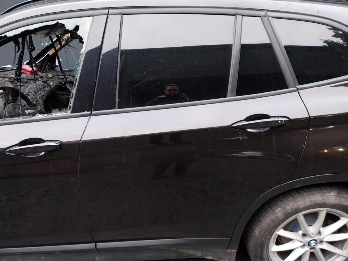 BMW X1 sDrive 18i 1.5 12V TwinPower Turbo Sloopvoertuig (2019, Donker, Bruin)