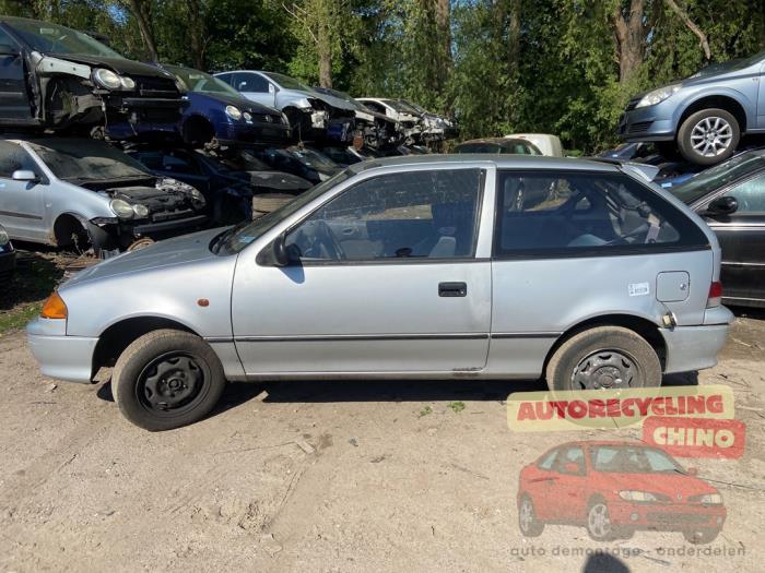 Suzuki Swift 1.0i Sloopvoertuig (2002, Zilver)