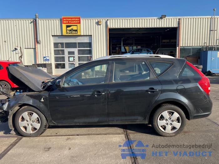 Kia Cee'd Sporty Wagon 1.4 16V Sloopvoertuig (2010, Zwart)