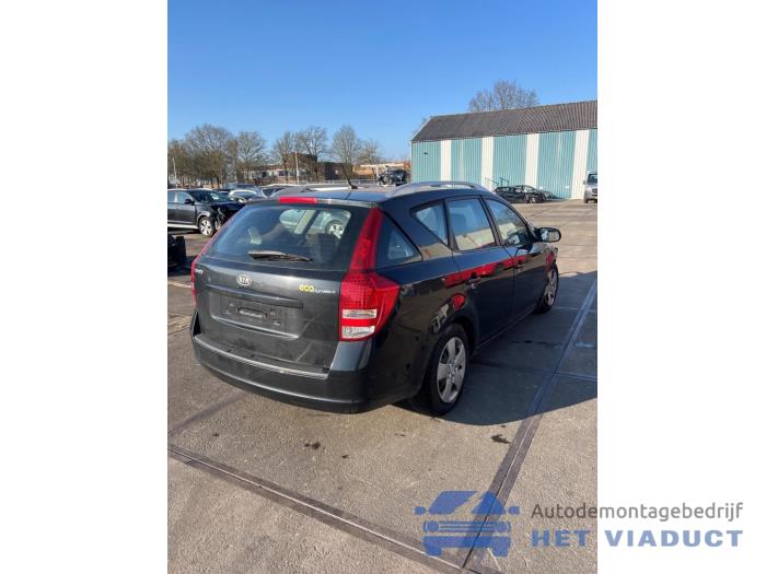 Kia Cee'd Sporty Wagon 1.4 16V Sloopvoertuig (2010, Zwart)